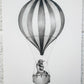 Pencil Drawing of a Regal Bird Siting Regally in a Hot Air Balloon