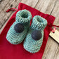 Green wool baby booties