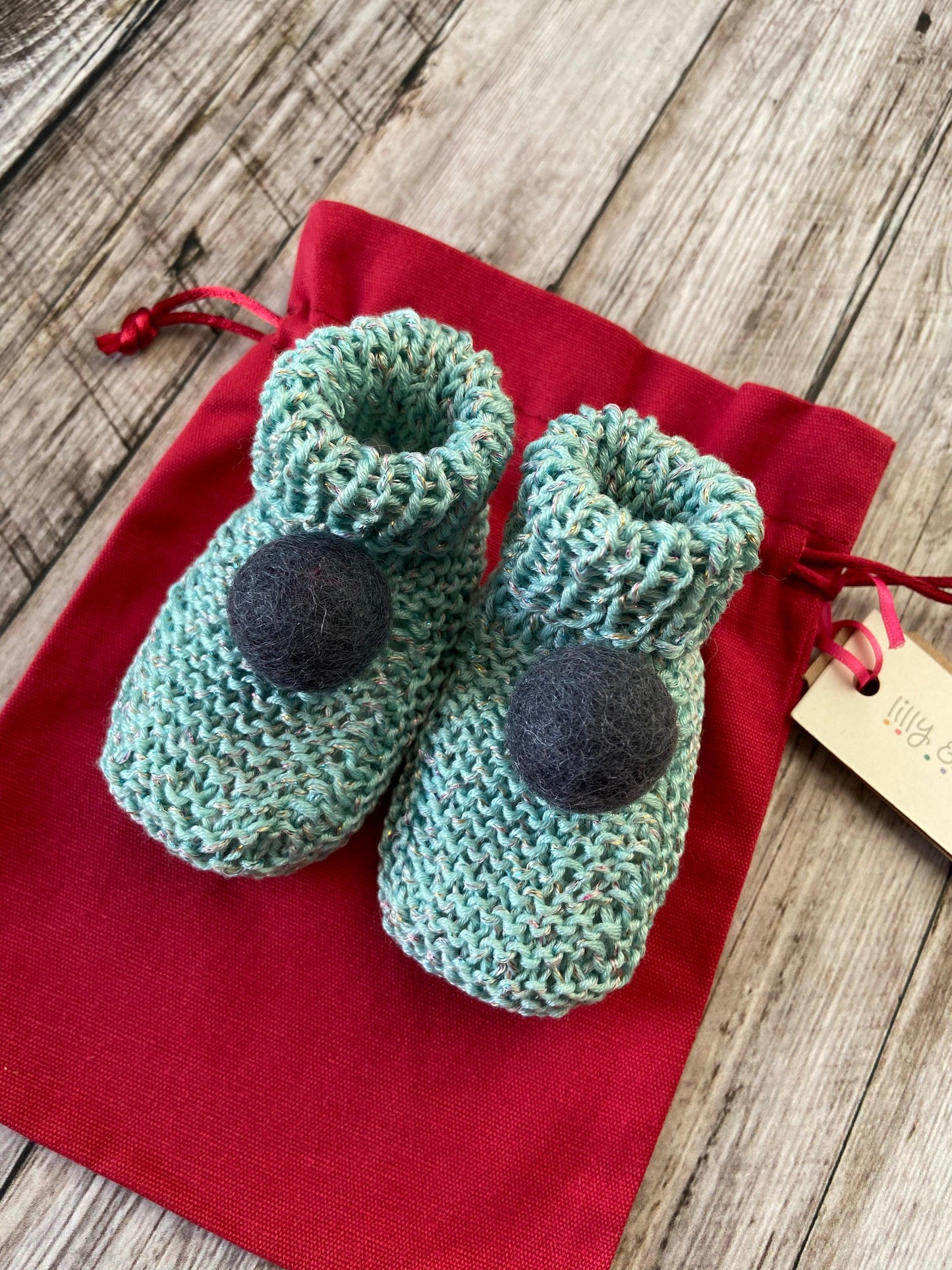 Green wool baby booties